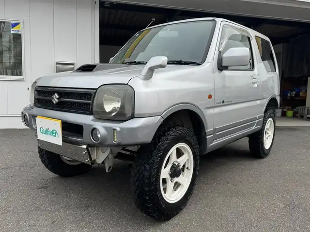 スズキ ジムニー ランドベンチャー 愛知県 2003(平15)年 15.4万km シルキーシルバーメタリック ユーザー買取車/禁煙車/ハーフレザーシート/モモステアリング/F5速/リフトアップ/4WD/社外F.R ショートバンパー/社外マフラー（ウイルスウイン）/リヤスポイラー