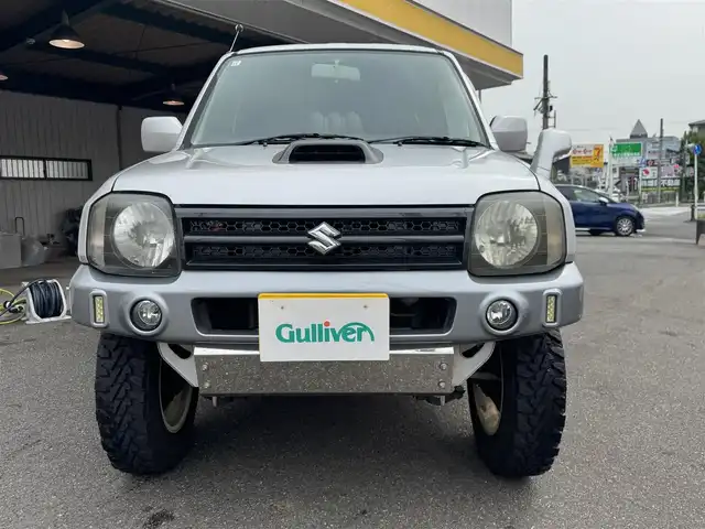 スズキ ジムニー ランドベンチャー 愛知県 2003(平15)年 15.4万km シルキーシルバーメタリック ユーザー買取車/禁煙車/ハーフレザーシート/モモステアリング/F5速/リフトアップ/4WD/社外F.R ショートバンパー/社外マフラー（ウイルスウイン）/リヤスポイラー
