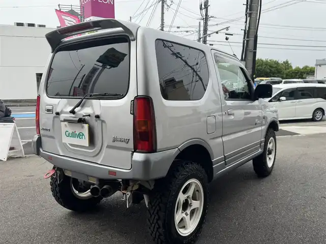 スズキ ジムニー ランドベンチャー 愛知県 2003(平15)年 15.4万km シルキーシルバーメタリック ユーザー買取車/禁煙車/ハーフレザーシート/モモステアリング/F5速/リフトアップ/4WD/社外F.R ショートバンパー/社外マフラー（ウイルスウイン）/リヤスポイラー