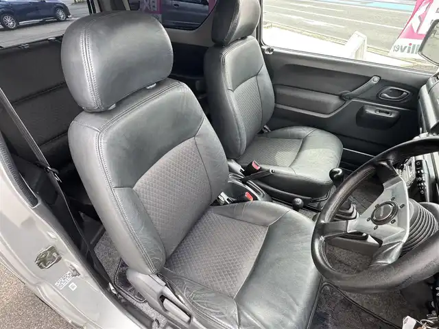 スズキ ジムニー ランドベンチャー 愛知県 2003(平15)年 15.4万km シルキーシルバーメタリック ユーザー買取車/禁煙車/ハーフレザーシート/モモステアリング/F5速/リフトアップ/4WD/社外F.R ショートバンパー/社外マフラー（ウイルスウイン）/リヤスポイラー