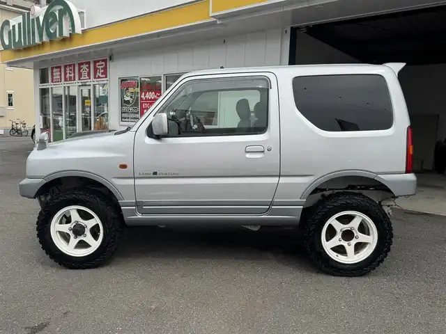 スズキ ジムニー ランドベンチャー 愛知県 2003(平15)年 15.4万km シルキーシルバーメタリック ユーザー買取車/禁煙車/ハーフレザーシート/モモステアリング/F5速/リフトアップ/4WD/社外F.R ショートバンパー/社外マフラー（ウイルスウイン）/リヤスポイラー