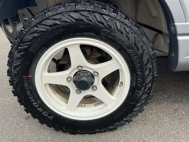 スズキ ジムニー ランドベンチャー 愛知県 2003(平15)年 15.4万km シルキーシルバーメタリック ユーザー買取車/禁煙車/ハーフレザーシート/モモステアリング/F5速/リフトアップ/4WD/社外F.R ショートバンパー/社外マフラー（ウイルスウイン）/リヤスポイラー