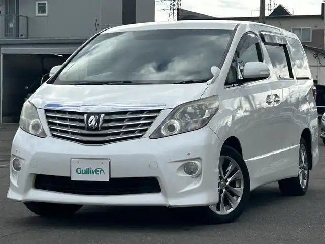 トヨタ アルファード 240S プライムセレクションⅡ 道央・札幌 2011(平23)年 17.4万km ホワイトパールクリスタルシャイン ４WD/寒冷地仕様/純正ディーラーOPナビ/CD/DVD/BT/フルセグ/純正フリップダウンモニター/横滑り防止装置/コーナーセンサー/バックカメラ/ETC/ECOMODE/ワイパーデアイサー/両側パワースライドドア/パワーバックドア/オットマン/プッシュスタート/スマートキー/ハロゲンヘッドライト/オートライト/フォグランプ/電動格納ミラー/ウィンカーミラー/純正フロアマット/ドアバイザー/スペアキー