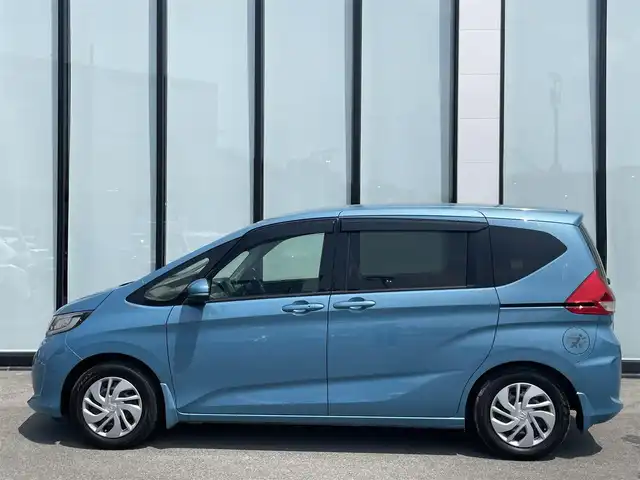 ホンダ フリード G ホンダセンシング 大阪府 2016(平28)年 4.7万km ブルーホライゾンM ホンダセンシング/両側パワースライドドア/純正SDナビ/Bluetooth/CD/DVD/フルセグTV/USB/9インチフリップダウン/バックカメラ/前後ドライブレコーダー/ビルトインETC/ベンチシート/純正フロアマット
