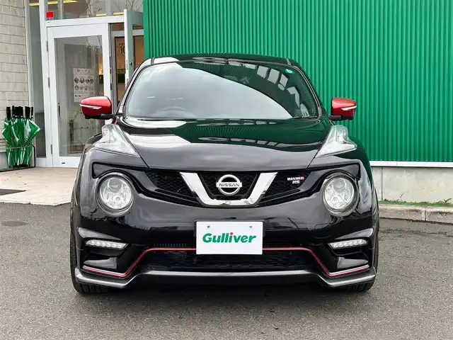 日産 ジューク ニスモ RS 宮城県 2014(平26)年 2万km スーパーブラック アラウンドビューモニター/＝＝＝/純正7インチナビ/(フルセグTV/CD/DVD/SD/BT/USB/AUX)/4WD/ビルトインETC/MTモード付AT/パドルシフト/オートエアコン/オートライト/革巻きステアリング/プッシュスタート＆スマートキー/ウインカー付き電動格納ミラー/ドアバイザー/ふらつき防止/HIDヘッドライト/フォグランプ/純正フロアマット/ENKEI18インチアルミホイール
