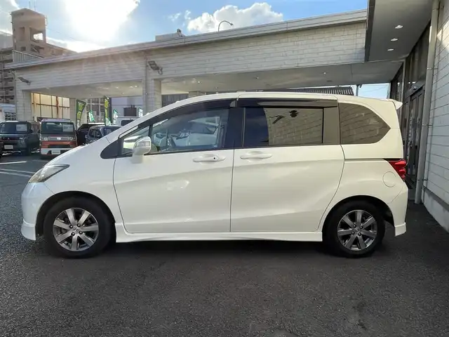 ホンダ フリード Gエアロ ジャストセレクション 大分県 2009(平21)年 5.2万km プレミアムホワイトパール ワンオーナー/両側パワースライドドア/純正15インチアルミホール/エンジンスターター/HIDヘッドライト/フォグランプ/オートライト/レザーステアリング/チルトステアリング/ウインカーミラー/リアプライバシーガラス/ドアバイザー/フロアマット/電動格納ミラー/Wエアバッグ/ABS/スマートキー×2/保証書/車両取説