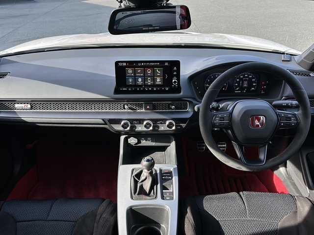 ホンダ シビック タイプR 愛知県 2023(令5)年 2.4万km チャンピオンシップホワイト ワンオーナ/純正リアウィング/デジタルインナーミラー/無限シフトノブ/ドライブレコーダー/ワンオーナー/取扱説明書/Bluetooth/ワンセグTV/バックカメラ/純正アルミホイール/純正フロアマット/純正アルカンターラステアリング/ACC/レーンキープアシスト/ブレーキホールド/コーナーセンサー/オートマチックハイビーム