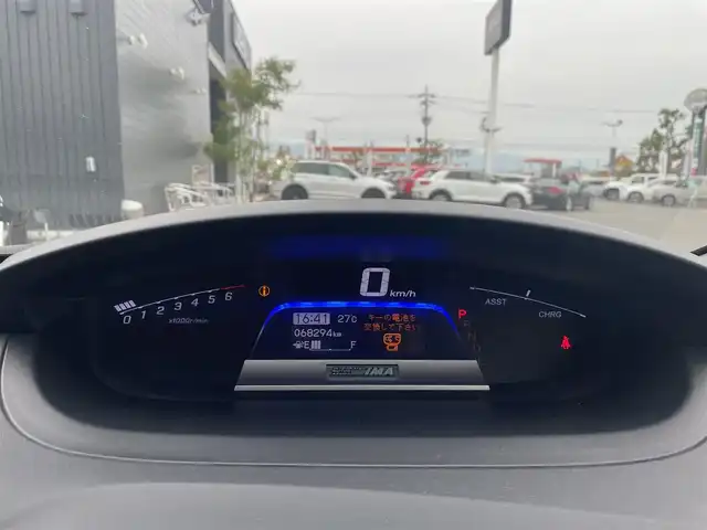ホンダ フリード ハイブリット ジャストセレクション 滋賀県 2013(平25)年 6.9万km スーパープラチナメタリック 社外ナビ/フルセグTV/ETC/ドライブレコーダー/クルーズコントロール/３列シート/両側オートスライドドア/社外１５インチAW/VDC