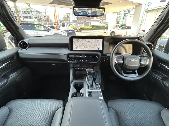 トヨタ ランドクルーザー ２５０ VX 福岡県 2024(令6)年 1.9万km ブラック ワンオーナー/純正メーカーナビ【AM/FM/BT/フルセグTV】/モデリスタエアロ/サンルーフ/レーダークルーズコントロール/アラウンドビューモニター/ブラインドスポットモニター/トヨタチームメイト/TOYOTA　SAFETY　SENSE/-プリクラッシュセーフティ/-レーントレーシングアシスト/-レーンディパーチャーアラート/-アダプティブハイビームシステム／オートマチックハイビーム/-ロードサインアシスト/-ドライバー異常時対応システム/-プロアクティブドライビングアシスト/-発進遅れ告知機能：先行車/-緊急時操舵支援（アクティブ操舵機能付）/-フロントクロストラフィックアラート/-レーンチェンジアシスト/ビルトインETC2.0/運転席・助手席シートヒーター/運転席・助手席エアシート/運転席パワーシート/デジタルインナーミラー/電動リアゲート/保証書/取扱説明書