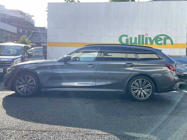 ＢＭＷ ３２０ｉ ツーリング Mスポーツ 東京都 2020(令2)年 3.9万km ミネラルグレー ワンオーナー/ドライビングアシストプロフェッショナル/・アクティブクルーズコントロール/・ステアリング/レーンコントロール/・レーンディパーチャーウォーニング/・レーンチェンジウォーニング/・アクティブサイドコリジョンプロテクション/・クロストラフィックウォーニング/・前車接近警告機能/・後車衝突警告機能/・エマージェンシーストップアシスト/・トラフィックサインアシスト/・衝突回避/被害軽減ブレーキ/・高速道路渋滞時ハンズオフアシスト/・エマージェンシーストップアシスト/・トラフィックサインアシスト（速度制限）/HDDナビ（10.25インチワイドディスプレイ）/パークディスタンスコントロール/パーキングアシスト/リアビューカメラ/リバースアシスト/アダプティブLEDヘッドランプ/ハイビームアシスタント/Mエンブレム付革巻きステアリング/パドルシフト/ETC/12.3インチマルチディスプレイメーターパネル/パワーシート（前席）/シートヒーター（前席）/パワーバックドア/コンフォートアクセス（スマートオープン/クローズ機能）