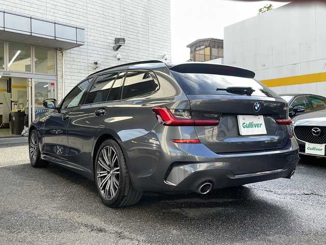 ＢＭＷ ３２０ｉ ツーリング Mスポーツ 東京都 2020(令2)年 3.9万km ミネラルグレー ワンオーナー/ドライビングアシストプロフェッショナル/・アクティブクルーズコントロール/・ステアリング/レーンコントロール/・レーンディパーチャーウォーニング/・レーンチェンジウォーニング/・アクティブサイドコリジョンプロテクション/・クロストラフィックウォーニング/・前車接近警告機能/・後車衝突警告機能/・エマージェンシーストップアシスト/・トラフィックサインアシスト/・衝突回避/被害軽減ブレーキ/・高速道路渋滞時ハンズオフアシスト/・エマージェンシーストップアシスト/・トラフィックサインアシスト（速度制限）/HDDナビ（10.25インチワイドディスプレイ）/パークディスタンスコントロール/パーキングアシスト/リアビューカメラ/リバースアシスト/アダプティブLEDヘッドランプ/ハイビームアシスタント/Mエンブレム付革巻きステアリング/パドルシフト/ETC/12.3インチマルチディスプレイメーターパネル/パワーシート（前席）/シートヒーター（前席）/パワーバックドア/コンフォートアクセス（スマートオープン/クローズ機能）