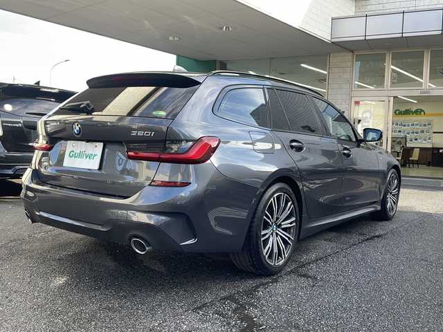 ＢＭＷ ３２０ｉ ツーリング Mスポーツ 東京都 2020(令2)年 3.9万km ミネラルグレー ワンオーナー/ドライビングアシストプロフェッショナル/・アクティブクルーズコントロール/・ステアリング/レーンコントロール/・レーンディパーチャーウォーニング/・レーンチェンジウォーニング/・アクティブサイドコリジョンプロテクション/・クロストラフィックウォーニング/・前車接近警告機能/・後車衝突警告機能/・エマージェンシーストップアシスト/・トラフィックサインアシスト/・衝突回避/被害軽減ブレーキ/・高速道路渋滞時ハンズオフアシスト/・エマージェンシーストップアシスト/・トラフィックサインアシスト（速度制限）/HDDナビ（10.25インチワイドディスプレイ）/パークディスタンスコントロール/パーキングアシスト/リアビューカメラ/リバースアシスト/アダプティブLEDヘッドランプ/ハイビームアシスタント/Mエンブレム付革巻きステアリング/パドルシフト/ETC/12.3インチマルチディスプレイメーターパネル/パワーシート（前席）/シートヒーター（前席）/パワーバックドア/コンフォートアクセス（スマートオープン/クローズ機能）