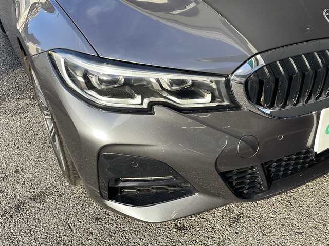 ＢＭＷ ３２０ｉ ツーリング Mスポーツ 東京都 2020(令2)年 3.9万km ミネラルグレー ワンオーナー/ドライビングアシストプロフェッショナル/・アクティブクルーズコントロール/・ステアリング/レーンコントロール/・レーンディパーチャーウォーニング/・レーンチェンジウォーニング/・アクティブサイドコリジョンプロテクション/・クロストラフィックウォーニング/・前車接近警告機能/・後車衝突警告機能/・エマージェンシーストップアシスト/・トラフィックサインアシスト/・衝突回避/被害軽減ブレーキ/・高速道路渋滞時ハンズオフアシスト/・エマージェンシーストップアシスト/・トラフィックサインアシスト（速度制限）/HDDナビ（10.25インチワイドディスプレイ）/パークディスタンスコントロール/パーキングアシスト/リアビューカメラ/リバースアシスト/アダプティブLEDヘッドランプ/ハイビームアシスタント/Mエンブレム付革巻きステアリング/パドルシフト/ETC/12.3インチマルチディスプレイメーターパネル/パワーシート（前席）/シートヒーター（前席）/パワーバックドア/コンフォートアクセス（スマートオープン/クローズ機能）