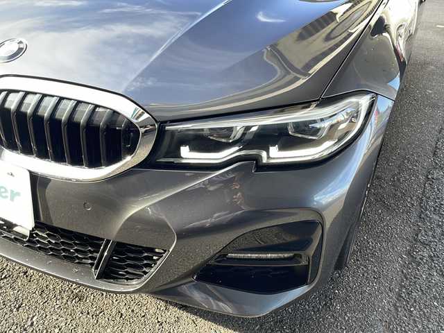 ＢＭＷ ３２０ｉ ツーリング Mスポーツ 東京都 2020(令2)年 3.9万km ミネラルグレー ワンオーナー/ドライビングアシストプロフェッショナル/・アクティブクルーズコントロール/・ステアリング/レーンコントロール/・レーンディパーチャーウォーニング/・レーンチェンジウォーニング/・アクティブサイドコリジョンプロテクション/・クロストラフィックウォーニング/・前車接近警告機能/・後車衝突警告機能/・エマージェンシーストップアシスト/・トラフィックサインアシスト/・衝突回避/被害軽減ブレーキ/・高速道路渋滞時ハンズオフアシスト/・エマージェンシーストップアシスト/・トラフィックサインアシスト（速度制限）/HDDナビ（10.25インチワイドディスプレイ）/パークディスタンスコントロール/パーキングアシスト/リアビューカメラ/リバースアシスト/アダプティブLEDヘッドランプ/ハイビームアシスタント/Mエンブレム付革巻きステアリング/パドルシフト/ETC/12.3インチマルチディスプレイメーターパネル/パワーシート（前席）/シートヒーター（前席）/パワーバックドア/コンフォートアクセス（スマートオープン/クローズ機能）