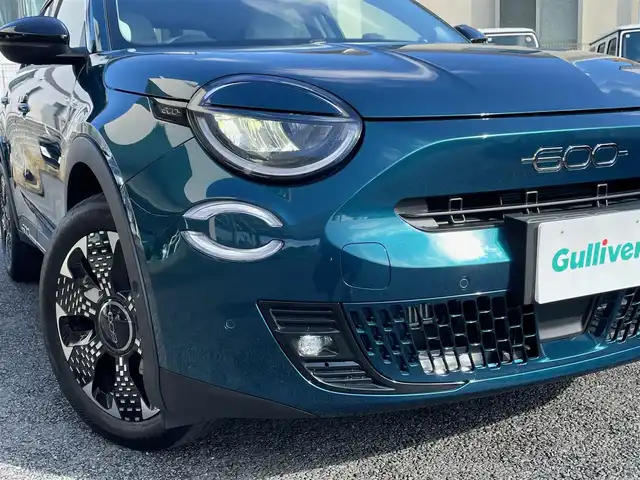 フィアット フィアット ６００ ラ プリマ 神奈川県 2025(令7)年 0.4万km 青 ワンオーナー/ベージュ革シート/純正メモリーナビ/バックモニター/ETC2.0/純正USB/BT/ミラーリング/ワイヤレス充電/前席シートヒーター/運転席パワーシート/純正18インチAW/LEDライト/LEDフォグ/レーダークルーズコントロール/衝突軽減ブレーキ/LKA/BSM/標識検知/コーナーセンサー/パワーバックドア/パドルシフト/プッシュスタート/スマートキー×2/R7年ディーラー整備記録/保証書・取説あり