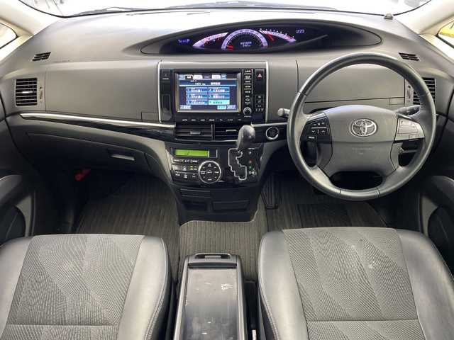 トヨタ エスティマ アエラス プレミアムエディション 岐阜県 2013(平25)年 8.3万km ホワイトパールクリスタルシャイン 純正ナビ/CD/DVD/Bluetooth/HDD/VTR/フルセグTV/バックモニター/両側パワースライドドア/クルーズコントロール/パワーシート/ETC/ステアリングリモコン/革巻きステアリング/電動格納ミラー/純正フロアマット/純正ドアバイザー/純正18インチアルミホイール/スマートキー/プッシュスタート/ハーフレザー/オットマン