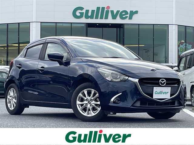 マツダ デミオ XD 島根県 2017(平29)年 7.1万km ディープクリスタルブルーマイカ 登録時走行距離　70992km/取扱説明書/純正ナビ/（Bluetooth/AM/FM/CD/DVD)/フルセグテレビ/バックカメラ/クルーズコントロール/スマートシティブレーキサポート/シートヒーター（DN席）/純正フロアマット/横滑り防止装置/プッシュスタート/スマートキー/オートライト/ドアバイザー/アイドリングストップ/ETC/純生アルミ１５インチ