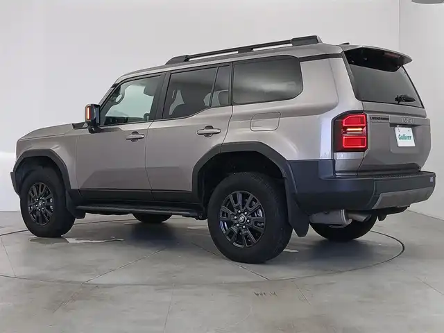 トヨタ ランドクルーザー ２５０ VX 愛知県 2024(令6)年 2.3万km アバンギャルドブロンズメタリック トヨタセーフティーセンス/　・プリクラッシュセーフティ/　・レーントレーシングアシスト/　・レーンディパーチャーアラート/　・レーダークルーズコントロール/　・オートマチックハイビーム/　・ロードサインアシスト/　・ドライバー異常時対応システム/　・プロアクティブドライビングアシスト/　・発信遅れ告知機能/サンルーフ/ブラインドスポットモニター/純正12.3インチナビ/（Bluetooth/フルセグTV/HDMI/USB/）/全方位カメラ/ETC2.0/ドライブレコーダー/デジタルインナーミラー/電動リアゲード/純正フロアマット/合皮シート/シートヒーター/シートクーラー/ステアリングヒート/ステアリングリモコン/LEDライト/ルーフレール/MTモード付AT/スマートキー/オートライト
