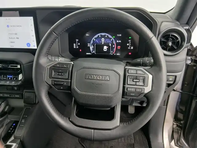 トヨタ ランドクルーザー ２５０ VX 愛知県 2024(令6)年 2.3万km アバンギャルドブロンズメタリック トヨタセーフティーセンス/　・プリクラッシュセーフティ/　・レーントレーシングアシスト/　・レーンディパーチャーアラート/　・レーダークルーズコントロール/　・オートマチックハイビーム/　・ロードサインアシスト/　・ドライバー異常時対応システム/　・プロアクティブドライビングアシスト/　・発信遅れ告知機能/サンルーフ/ブラインドスポットモニター/純正12.3インチナビ/（Bluetooth/フルセグTV/HDMI/USB/）/全方位カメラ/ETC2.0/ドライブレコーダー/デジタルインナーミラー/電動リアゲード/純正フロアマット/合皮シート/シートヒーター/シートクーラー/ステアリングヒート/ステアリングリモコン/LEDライト/ルーフレール/MTモード付AT/スマートキー/オートライト