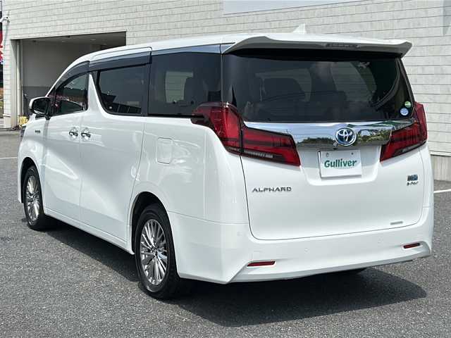 トヨタ アルファードハイブリット G 千葉県 2019(平31)年 1.8万km ホワイトパールクリスタルシャイン ワンオーナー/純正9インチSDナビ/フルセグTV/Bluetooth/DVD/CD/USB/フリップダウンモニター/ETC2.0/全周囲カメラ/バックカメラ/3眼LEDライト/JBLサウンド/デジタルインナーミラー/PCS/LTA/PKSB/RCTA/RSA/アダプティブクルーズコントロール/パワーバックドア/純正17インチアルミホイール/D＋N席パワーシート/D＋N席シートヒーター/エアシート/両側パワースライドドア/純正フロアマット/オットマン/横滑り防止装置/保証書/取扱説明書/記録薄