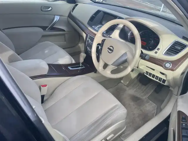 日産 ティアナ 250XL 福岡県 2012(平24)年 7.8万km サファイアブラック (株)IDOMが運営する【じしゃロン八幡西店】の自社ローン対象車両になります。こちらは現金ご利用時の価格です。自社ローンご希望の方は別途その旨お申付け下さい。/純正メモリナビ/・ワンセグTV/CD/バックカメラ/パワーシート/オットマン（N席）/純正16インチアルミホイール/純正キセノンヘッドライト/フォグランプ/純正フロアマット/クルーズコントロール/ビークルダイナミクスコントロール（VDC）/ビルトインETC/ドアバイザー/電格ミラー/スマートキー×2/取扱説明書/保証書