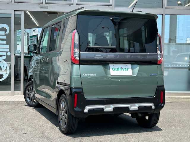 三菱 デリカミニ G 青森県 2024(令6)年 0.6万km ＤグリーンⅡ 社外ディスプレイオーディオ(Bluetooth/ラジオ/CD)/社外エンジンスターター/前席シートヒーター/ドライブレコーダー(前方)/バックカメラ/LEDヘッドライト/オートライト/片側パワースライドドア/左側ハンズフリーオートスライドドア/ルーフレール/衝突軽減ブレーキアシスト/踏み間違い衝突防止アシスト/ヒルディセントコントロール/ヘッドライトレベライザー/スペアキー/ETC/社外AW付き冬タイヤ積込み(165/60/15)/保証書/取扱説明書