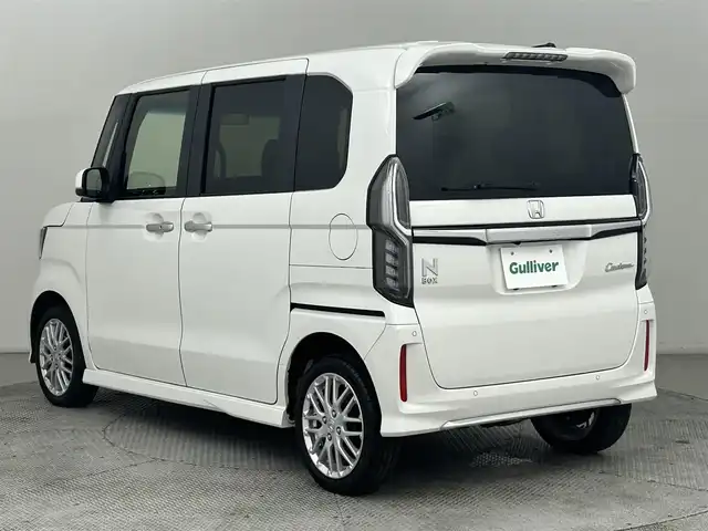 ホンダ Ｎ ＢＯＸ カスタム EX ターボ 道央・札幌 2023(令5)年 1.6万km パール ・４WD/・寒冷地仕様/・DOPモニター付オーディオ（WX-211C）/　CD/BT/ipod/ワンセグTV/・バックカメラ/・ビルトインETC/・衝突被害軽減ブレーキ/・レーンキープアシスト/・クリアランスソナー/・横滑り防止装置/・両側パワースライドドア/・オートライト/・LEDヘッドライト/・LEDフォグランプ/・ハーフレザーシート/・D+N席シートヒーター/・純正１５インチAW/・純正フロアマット/・プッシュスタート/・スマートキー