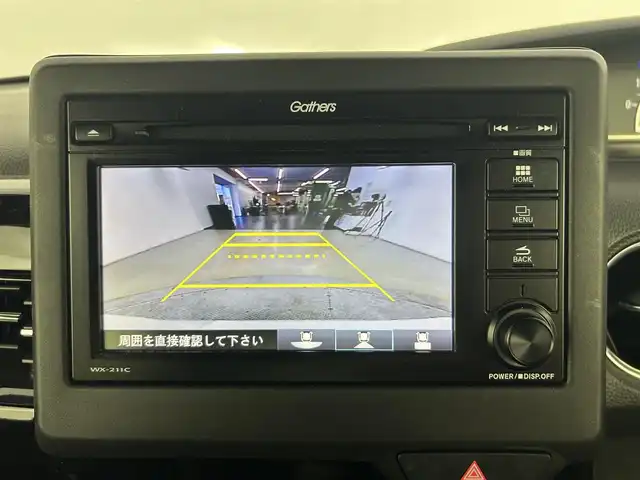 ホンダ Ｎ ＢＯＸ カスタム EX ターボ 道央・札幌 2023(令5)年 1.6万km パール ・４WD/・寒冷地仕様/・DOPモニター付オーディオ（WX-211C）/　CD/BT/ipod/ワンセグTV/・バックカメラ/・ビルトインETC/・衝突被害軽減ブレーキ/・レーンキープアシスト/・クリアランスソナー/・横滑り防止装置/・両側パワースライドドア/・オートライト/・LEDヘッドライト/・LEDフォグランプ/・ハーフレザーシート/・D+N席シートヒーター/・純正１５インチAW/・純正フロアマット/・プッシュスタート/・スマートキー