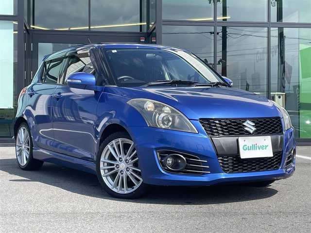 スズキ スイフト スポーツ 愛媛県 2012(平24)年 5.7万km ブーストブルーパールメタリック 6速MT/SDナビ（Bluetooth/フルセグTV/DVD再生）/バックカメラ/ETC/クルーズコントロール/純正フロアマット/USB入力端子/純正ドアバイザー/トノカバー/純正アルミホイール/スペアキー