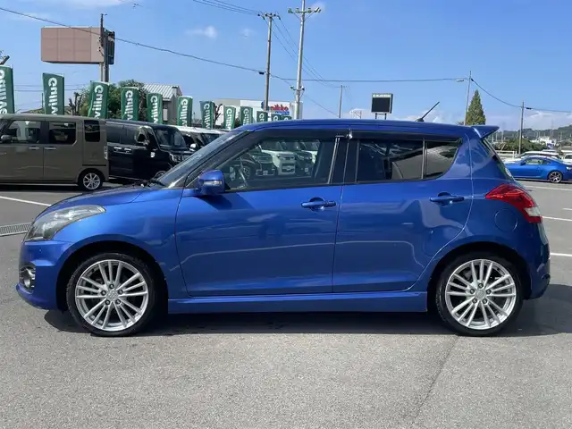 スズキ スイフト スポーツ 愛媛県 2012(平24)年 5.7万km ブーストブルーパールメタリック 6速MT/SDナビ（Bluetooth/フルセグTV/DVD再生）/バックカメラ/ETC/クルーズコントロール/純正フロアマット/USB入力端子/純正ドアバイザー/トノカバー/純正アルミホイール/スペアキー