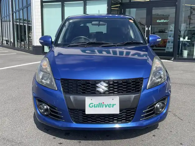 スズキ スイフト スポーツ 愛媛県 2012(平24)年 5.7万km ブーストブルーパールメタリック 6速MT/SDナビ（Bluetooth/フルセグTV/DVD再生）/バックカメラ/ETC/クルーズコントロール/純正フロアマット/USB入力端子/純正ドアバイザー/トノカバー/純正アルミホイール/スペアキー