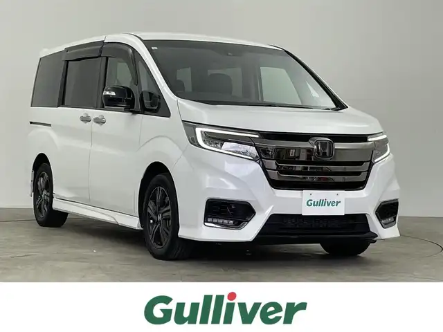 ホンダ ステップワゴン eHEVモデューロX ホンダS 千葉県 2020(令2)年 5.8万km プラチナホワイトパール 禁煙車/ホンダセンシング /・衝突軽減ブレーキ〈CMBS〉/・誤発進抑制機能/・歩行者事故低減ステアリング/・路外逸脱抑制機能/・渋滞追従機能付ACC〈アダプティブ・クルーズ・コントロール〉/・LKAS〈車線維持支援システム〉/・先行車発進お知らせ機能/・標識認識機能/純正10インチメモリナビ/純正フリップダウンモニター/両側パワースライドドア/ETC2.0/プッシュスタート＆スマートキー/ステアリングスイッチ/革巻きステアリング/前席シートヒーター/電動格納ミラー/電子パーキング/オートホールド /後席サンシェード/LEDヘッドライト/フォグライト/純正16インチアルミホイール