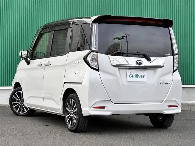 ダイハツ トール カスタムG ターボ 宮城県 2023(令5)年 1.7万km ブラックマイカメタリック/パールホワイトⅢ 2トーン コンフォータブルパック/・シートヒーター（運転席/助手席）/・シートバックテーブル（運転席/助手席）/＝＝＝/ワンオーナー/スマートアシスト/・衝突警報機能/・衝突回避支援ブレーキ機能/・ブレーキ制御付誤発進抑制機能/・先行車発進お知らせ機能/・アダプティブドライビングビーム/・アダプティブクルーズコントロール/・ふらつき警報/・サイドビューランプ/・コーナーセンサー/・路側逸脱警報/・標識認識機能/純正フリップダウンモニター/純正9インチナビ（NMZL-Y73D）/・CD/DVD/・Bluetooth/・フルセグTV/バックカメラ/ビルトインETC2.0/ウェルカムパワースライドドア（両側）/シートヒーター/革巻きステアリング/ステアリングスイッチ/LEDヘッドランプ/フォグランプ/オートライト/電動パーキングブレーキ/ブレーキホールド/スマートキー＆プッシュスタート/スペアキー/電動格納ミラー/純正リヤスポイラー（モデリスタセレクション）/純正コンソールBOX/純正クリーンポケット/純正15インチAW/純正ドアバイザー/純正フロアマット/Wエアバッグ