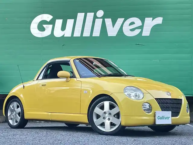 ダイハツ コペン アクティブトップ 東京都 2002(平14)年 4.6万km ジョーヌイエロー ワンオーナー/禁煙車/Gパック/・プロジェクター式HIDヘッドランプ/・イモビライザー/・MD/CD/・2スピーカー/アクティブトップ/ブラックファブリックシート/純正アルミホイール/純正フロアマット/リモコンキー/スペアキー×1