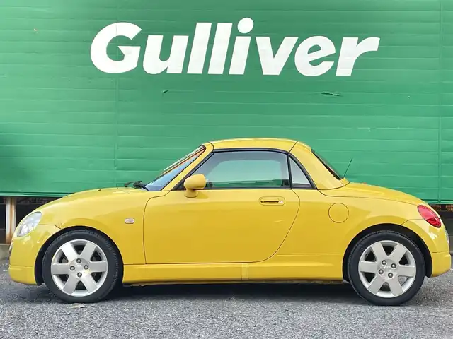 ダイハツ コペン アクティブトップ 東京都 2002(平14)年 4.6万km ジョーヌイエロー ワンオーナー/禁煙車/Gパック/・プロジェクター式HIDヘッドランプ/・イモビライザー/・MD/CD/・2スピーカー/アクティブトップ/ブラックファブリックシート/純正アルミホイール/純正フロアマット/リモコンキー/スペアキー×1