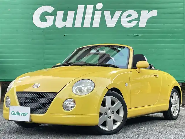 ダイハツ コペン アクティブトップ 東京都 2002(平14)年 4.6万km ジョーヌイエロー ワンオーナー/禁煙車/Gパック/・プロジェクター式HIDヘッドランプ/・イモビライザー/・MD/CD/・2スピーカー/アクティブトップ/ブラックファブリックシート/純正アルミホイール/純正フロアマット/リモコンキー/スペアキー×1