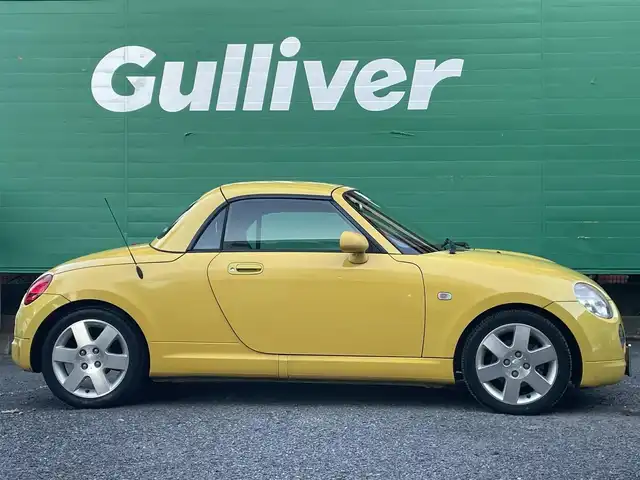 ダイハツ コペン アクティブトップ 東京都 2002(平14)年 4.6万km ジョーヌイエロー ワンオーナー/禁煙車/Gパック/・プロジェクター式HIDヘッドランプ/・イモビライザー/・MD/CD/・2スピーカー/アクティブトップ/ブラックファブリックシート/純正アルミホイール/純正フロアマット/リモコンキー/スペアキー×1
