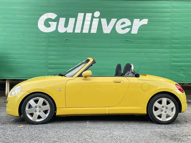 ダイハツ コペン アクティブトップ 東京都 2002(平14)年 4.6万km ジョーヌイエロー ワンオーナー/禁煙車/Gパック/・プロジェクター式HIDヘッドランプ/・イモビライザー/・MD/CD/・2スピーカー/アクティブトップ/ブラックファブリックシート/純正アルミホイール/純正フロアマット/リモコンキー/スペアキー×1