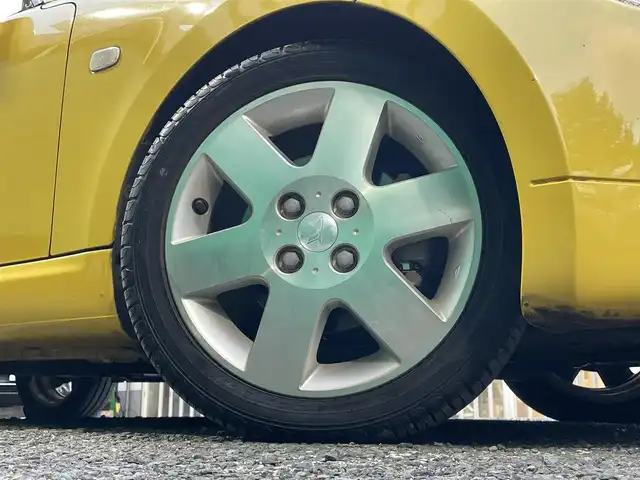 ダイハツ コペン アクティブトップ 東京都 2002(平14)年 4.6万km ジョーヌイエロー ワンオーナー/禁煙車/Gパック/・プロジェクター式HIDヘッドランプ/・イモビライザー/・MD/CD/・2スピーカー/アクティブトップ/ブラックファブリックシート/純正アルミホイール/純正フロアマット/リモコンキー/スペアキー×1