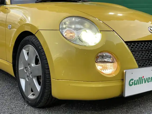 ダイハツ コペン アクティブトップ 東京都 2002(平14)年 4.6万km ジョーヌイエロー ワンオーナー/禁煙車/Gパック/・プロジェクター式HIDヘッドランプ/・イモビライザー/・MD/CD/・2スピーカー/アクティブトップ/ブラックファブリックシート/純正アルミホイール/純正フロアマット/リモコンキー/スペアキー×1