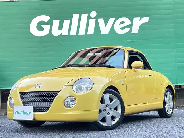 ダイハツ コペン アクティブトップ 東京都 2002(平14)年 4.6万km ジョーヌイエロー ワンオーナー/禁煙車/Gパック/・プロジェクター式HIDヘッドランプ/・イモビライザー/・MD/CD/・2スピーカー/アクティブトップ/ブラックファブリックシート/純正アルミホイール/純正フロアマット/リモコンキー/スペアキー×1
