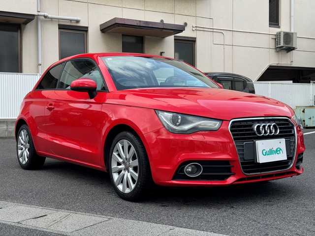 アウディ Ａ１ 1．4TFSI 岡山県 2013(平25)年 3.7万km ミサノレッドパールエフェクト 登録時走行距離36.535km/純正ナビ/(DISC/TV/Bluetooth)/アイドリングストップ/ヘッドライトレベライザー/純正16インチアルミホイール/フォグランプ/ETC/純正フロアマット/プッシュスタート/スマートキー