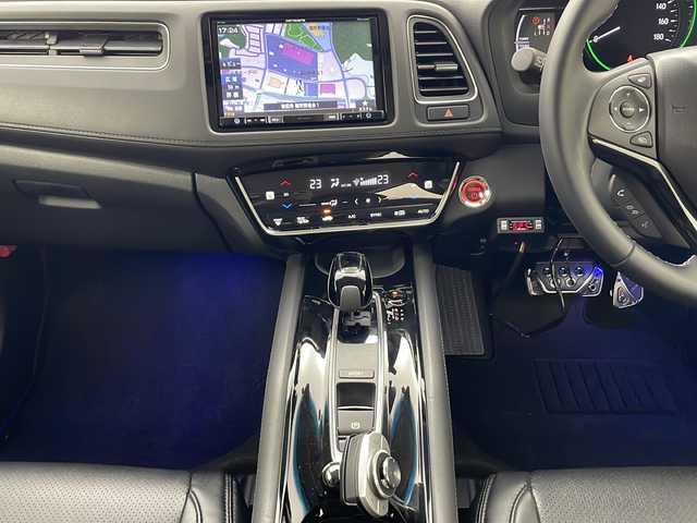 ホンダ ヴェゼル ハイブリッド Z ホンダセンシング 秋田県 2018(平30)年 1.3万km オーロラアメジストメタリック ４ＷＤ/衝突軽減システム（ホンダセンシング）/社外ＳＤナビ/(AM/FM・CD/DVD/フルセグＴＶ/BT)/バックカメラ/寒冷地仕様/パワーシート（D/N席）/ヒートシーター（D/N席）/レーダークルーズコントロール/パドルシフト/スマートキー/スペアキー/純正フロアマット/オートライト/前後ドライブレコーダー/ＥＴＣ/社外マフラー（ROSSO MODELLO）/取扱説明書