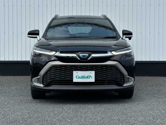 トヨタ カローラ クロス ハイブリッド Z 千葉県 2023(令5)年 4.4万km アティチュードブラックマイカ 純正9インチナビ/(フルセグTV BT FM AM)/バックカメラ/置くだけ充電/衝突被害軽減システム/車線逸脱警報/クルーズコントロール/ハーフレザーシート/横滑り防止装置/ビルトインETC/アイドリングストップ/LEDヘッドライト/フォグランプ/オートライト/ウィンカーミラー/電動格納ミラー/純正18インチAW/シートヒーター/シートリフター/プッシュスタート/スマートキー/フロアマット/ドアバイザー/スペアキー/取扱説明書