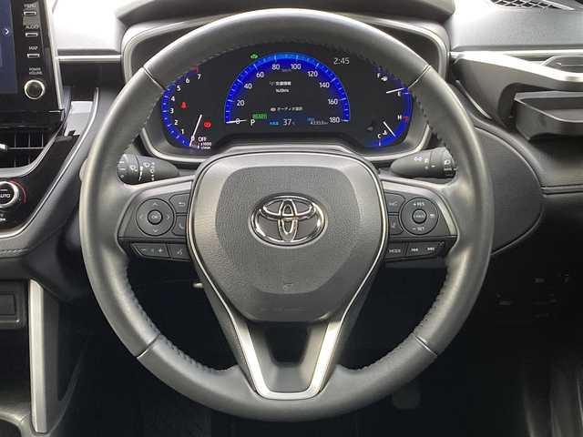 トヨタ カローラ クロス ハイブリッド Z 千葉県 2023(令5)年 4.4万km アティチュードブラックマイカ 純正9インチナビ/(フルセグTV BT FM AM)/バックカメラ/置くだけ充電/衝突被害軽減システム/車線逸脱警報/クルーズコントロール/ハーフレザーシート/横滑り防止装置/ビルトインETC/アイドリングストップ/LEDヘッドライト/フォグランプ/オートライト/ウィンカーミラー/電動格納ミラー/純正18インチAW/シートヒーター/シートリフター/プッシュスタート/スマートキー/フロアマット/ドアバイザー/スペアキー/取扱説明書