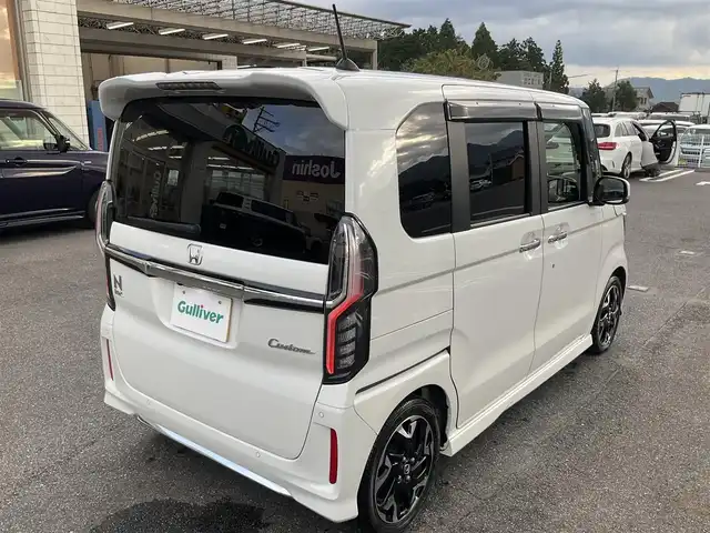 ホンダ Ｎ ＢＯＸ カスタム L ターボ 滋賀県 2023(令5)年 2.7万km プラチナホワイトパール ワンオーナー /車検令和8年5月まで/アルパイン11インチディスプレイオーディオ/　HDMI接続　AppleCarPlay対応/規格外純正15インチアルミホイール（前期用）/純正LEDヘッドライト/・LEDフォグランプ/両側パワースライドドア/ケンウッド360°前方ドライブレコーダー/バックカメラ/社外ETC/ハーフレザーシート/・前席シートヒーター/Honda SENSING/・衝突軽減ブレーキ/・誤発進抑制機能/・アダプティブクルーズコントロール（ACC）/・車線維持支援システム（LKAS）/・先行車発進お知らせ機能/・オートハイビーム/プラズマクラスター搭載オートエアコン/スペアキー/取扱説明書/保証書/