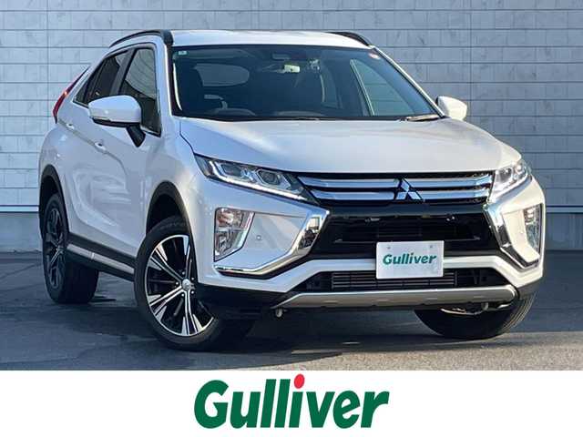 三菱 エクリプス クロス G 群馬県 2018(平30)年 1.8万km シルキーホワイト 純正７型ＳＤナビ　/フルセグ　/バックカメラ　/４ＷＤ　/パドルシフト　/ルーフレール　/前方ドラレコ　/純正１８インチＡＷ　/ＢＳＭ　/ＡＨＢ　/ＬＥＤヘッドライト　/純正フロアマット　/パーキングソナー　/本革ステアリング/S-AWC/ハンドルカバーあり/Bluetooth/ステアリングスイッチ/オートワイパー/フォグランプ/電動格納ミラー/パワーステアリング/スマートキー２本/アダプティブクルーズコントロール/アイドリングストップ