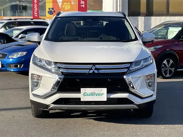 三菱 エクリプス クロス G 群馬県 2018(平30)年 1.8万km シルキーホワイト 純正７型ＳＤナビ　/フルセグ　/バックカメラ　/４ＷＤ　/パドルシフト　/ルーフレール　/前方ドラレコ　/純正１８インチＡＷ　/ＢＳＭ　/ＡＨＢ　/ＬＥＤヘッドライト　/純正フロアマット　/パーキングソナー　/本革ステアリング/S-AWC/ハンドルカバーあり/Bluetooth/ステアリングスイッチ/オートワイパー/フォグランプ/電動格納ミラー/パワーステアリング/スマートキー２本/アダプティブクルーズコントロール/アイドリングストップ