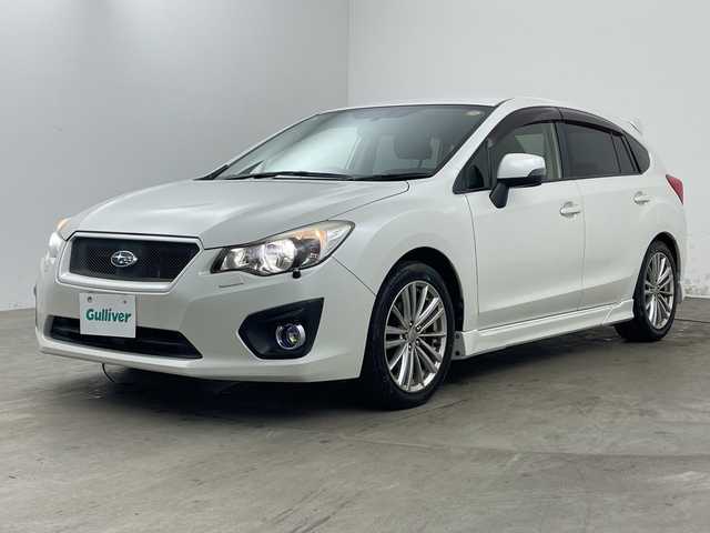 スバル インプレッサ スポーツ 2．0i－S 兵庫県 2013(平25)年 2.9万km サテンホワイトパール ・社外ナビ＆TV＆BT＆DVD/・運転席パワーシート/・クルーズコントロール/・パドルシフト/・革巻きステアリング/・ステアリングスイッチ/・ハーフレザーシート/・リモコンキー/・スペアキー/・アイドリングストップ/・HIDヘッドライト/・オートライト/・オートワイパー/・スポーツモード/・ウィンカーミラー
