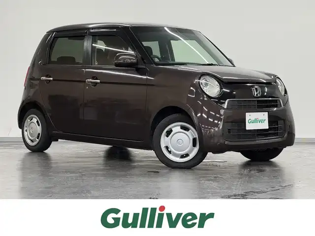 ホンダ Ｎ ＯＮＥ G Lパッケージ 三重県 2012(平24)年 9.6万km プレミアムディープモカパール ガソリン/FF/インパネCVT/イクリプス 7インチナビ AVN558HD/（AM/FM/CD/DVD/MUSIC JUKE/iPod/VTR/AUX）/ETC/安全/VSA/●ABS：アンチロックブレーキシステム/●TCS：トラクションコントロールシステム/●横すべり抑制/・ヒルスタートアシスト機能（坂道発進支援）/装備/・プロジェクタータイプディスチャージヘッドライト〈HID〉 /・オートライトシステム/・フルオートエアコン/・カーテンエアバッグシステム（前席/後席対応）/・電動格納ドアミラー（LEDウインカーランプ付）/・プッシュスタート/・14インチスチールホイール＋純正ホイールキャップ/・スマートキー